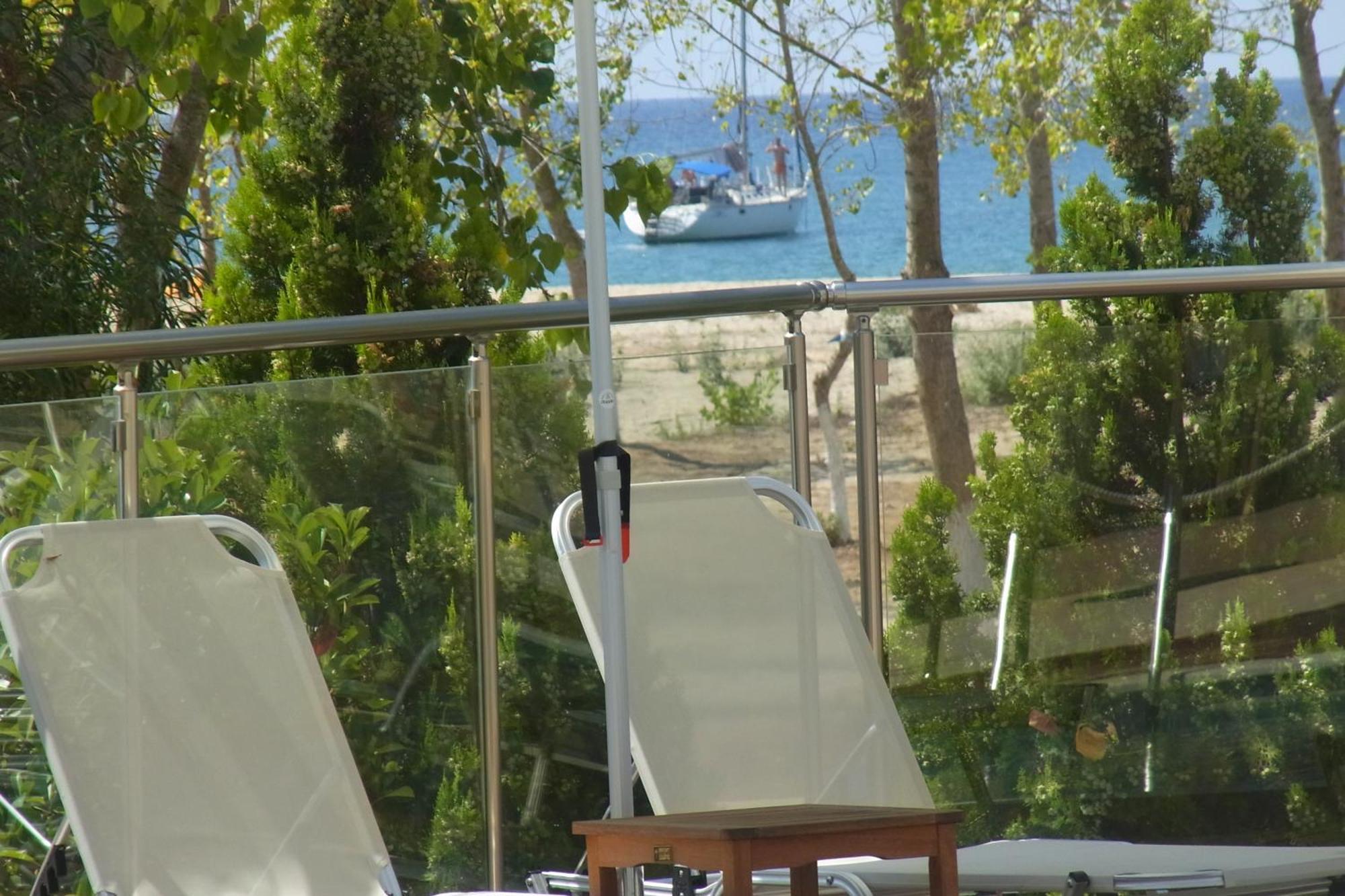 Ammos Bay Hotel Амудия Екстериор снимка